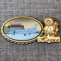 Магнит из смолы овальный эскимос "Аэропорт"